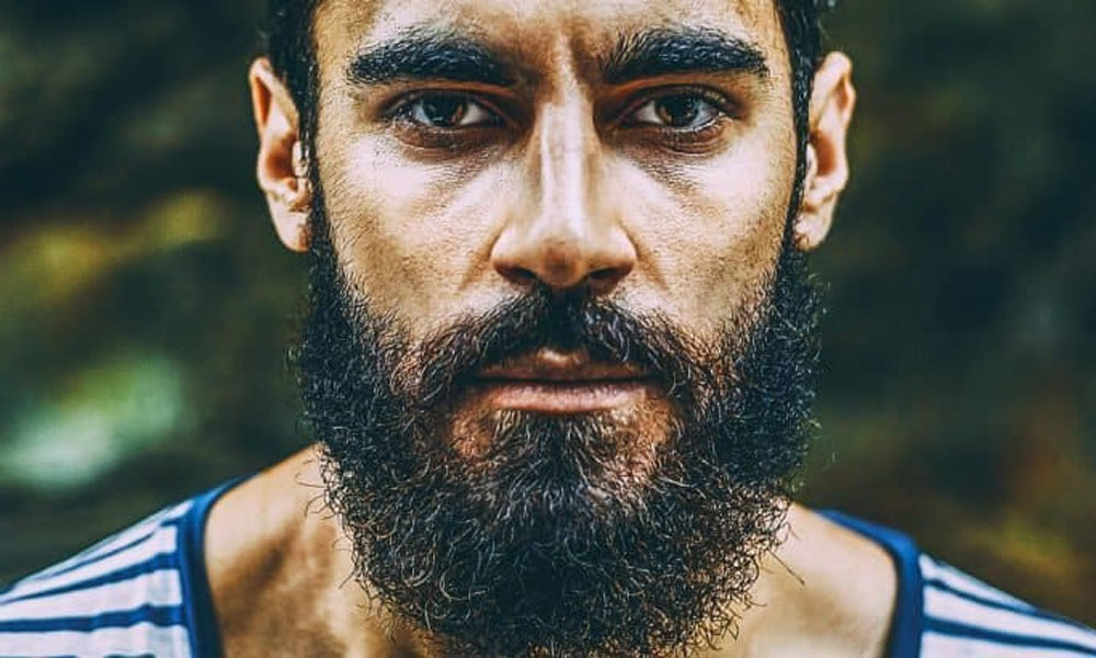 How To Style & Care For Curly Beard At Home