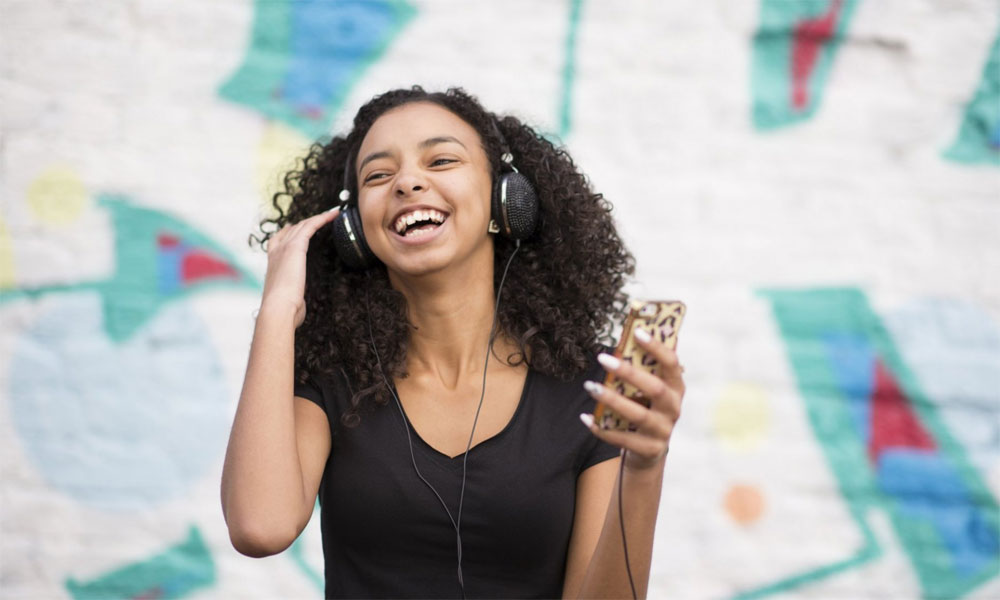 Science Reveals Why You Feel Happy When You Hear Your Favorite Song